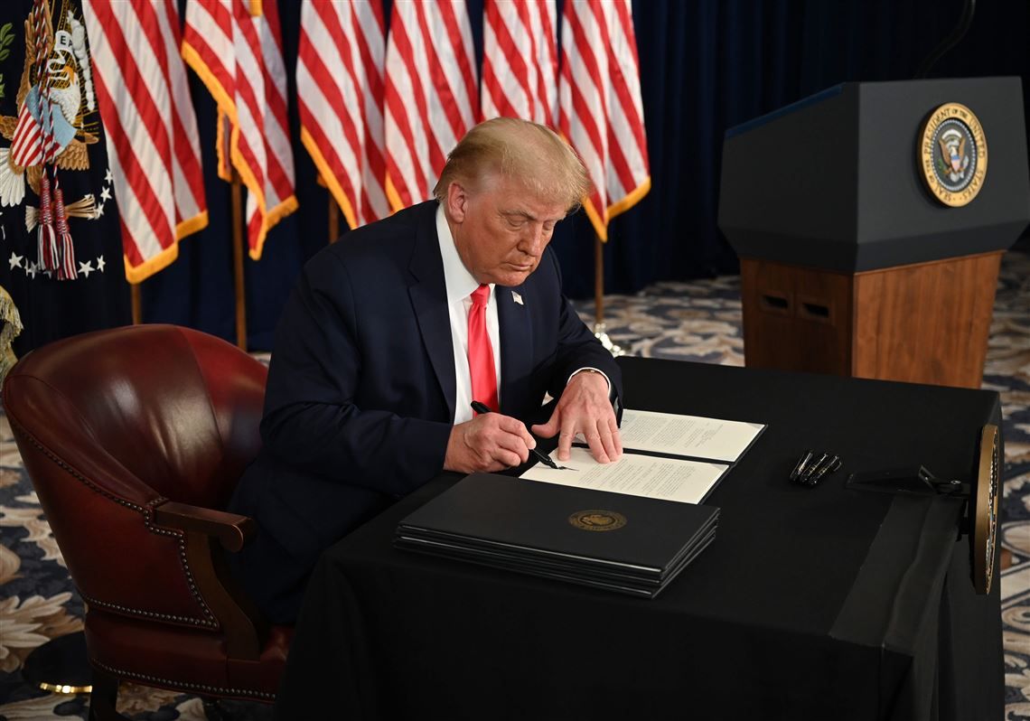 Trump signs executive order after COVID-19 relief bill talks stall in Congress