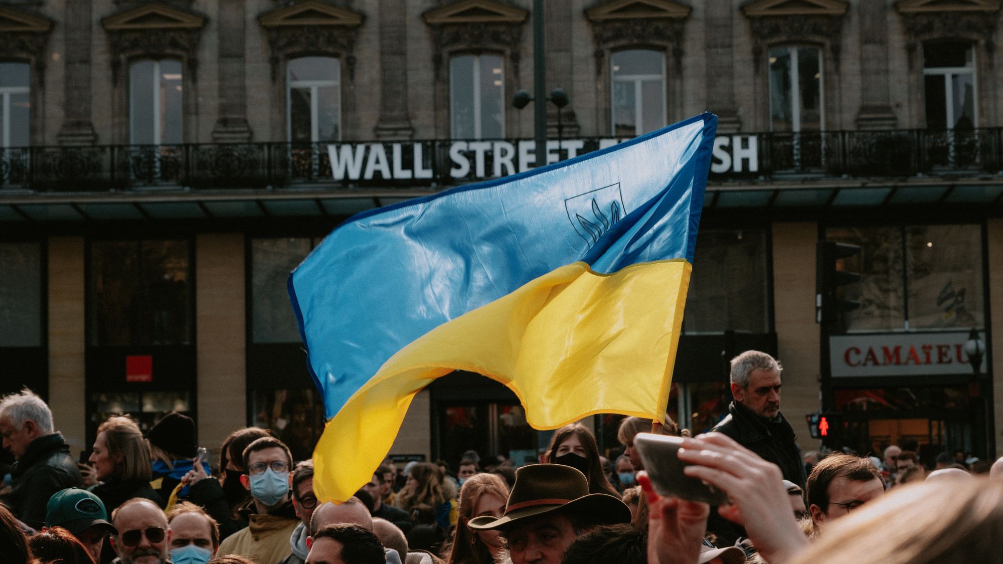 Ukraine flag waving in a crowd