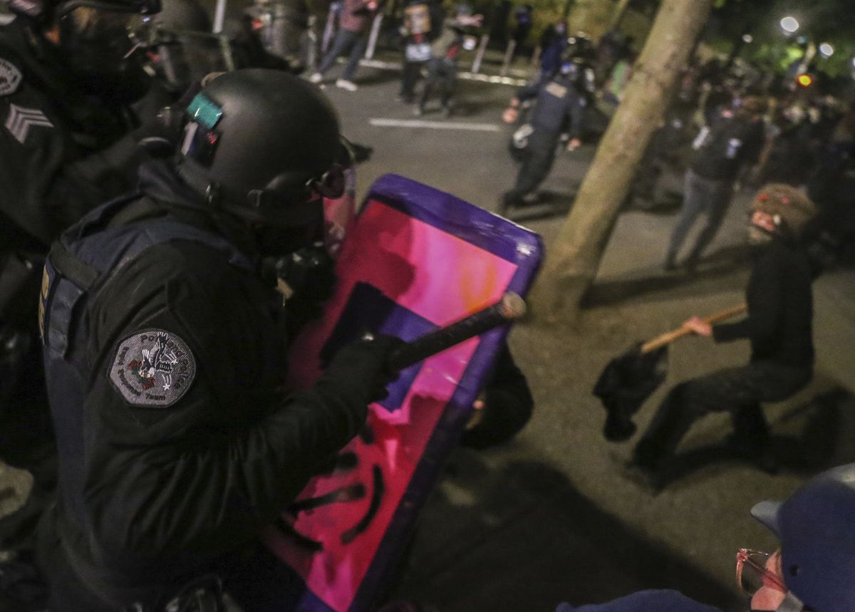 Portland protesters set fire to the city’s police association building