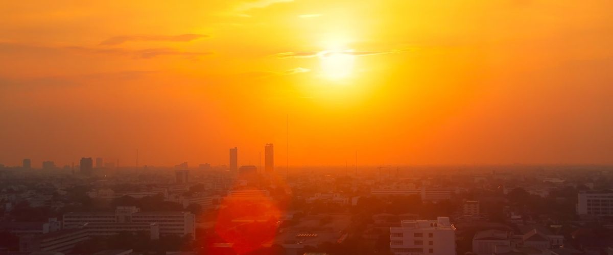 How does climate change cause heat waves?