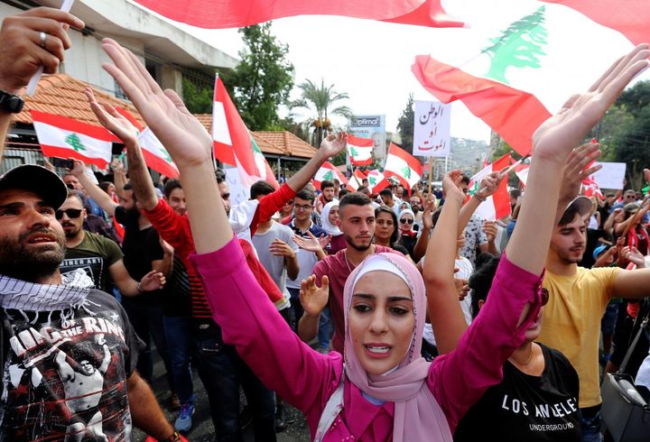 Almost 400 injured in Lebanon protests as clashes continue