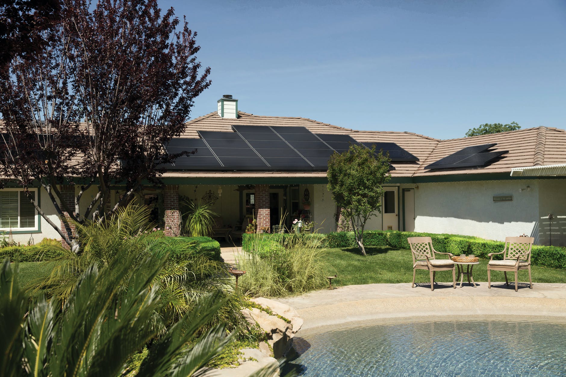 How will technology change in the next 20 years? Black solar panels on brown roof